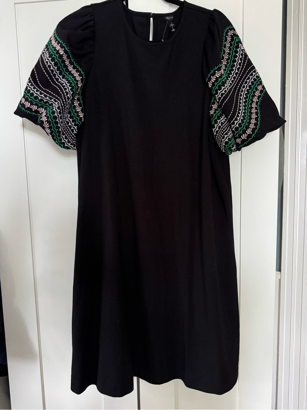 Ann Taylor black dress with embroidered sleeves. Large.